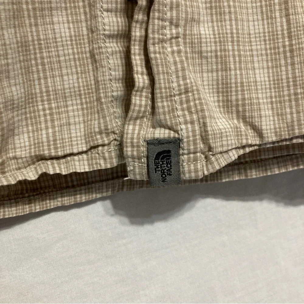 The North Face Men’s Tan Plaid Long Sleeve Shirt Size XL.